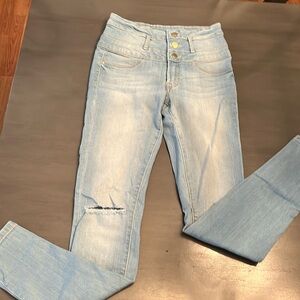 High waisted light wash ripped jeans